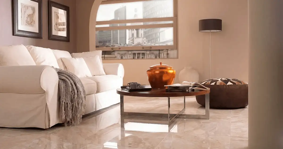 Modern living room with professionally installed marble flooring, a beige sofa, coffee table in Seattle, WA