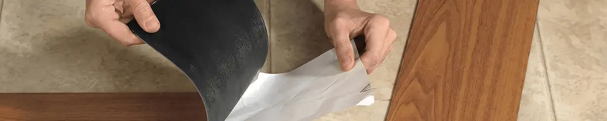 A professional installing vinyl flooring in Seattle, WA