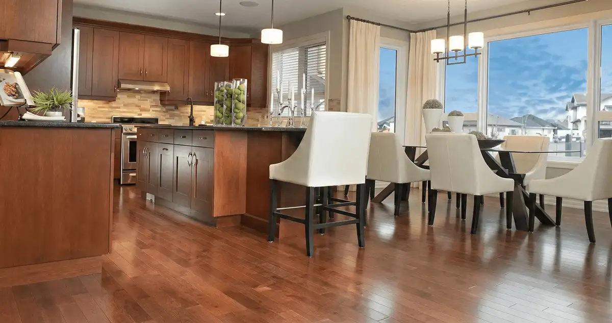 A modern kitchen with professionally installed wood flooring in Seattle, WA